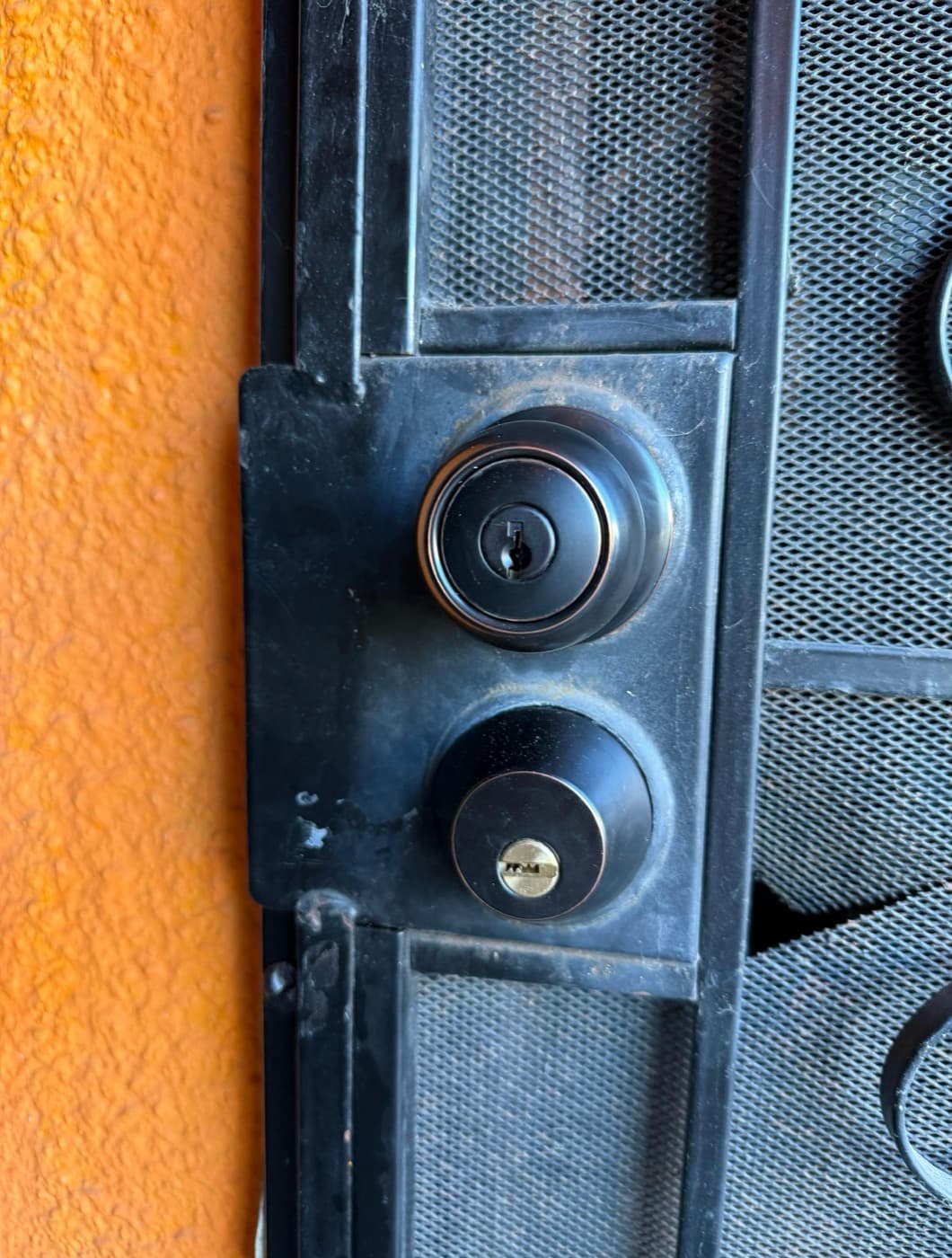 Double deadbolts installed on a security gate