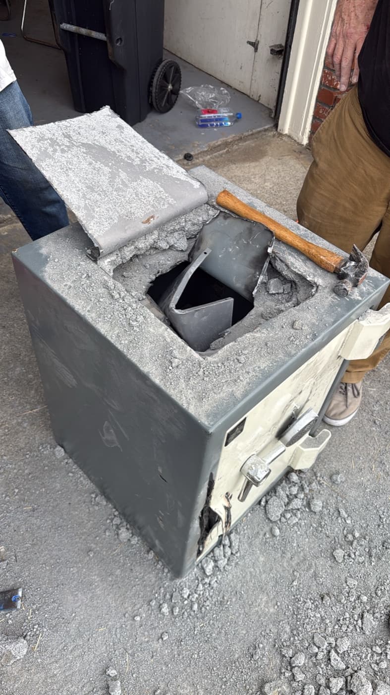 Safe door opened during a safe service job